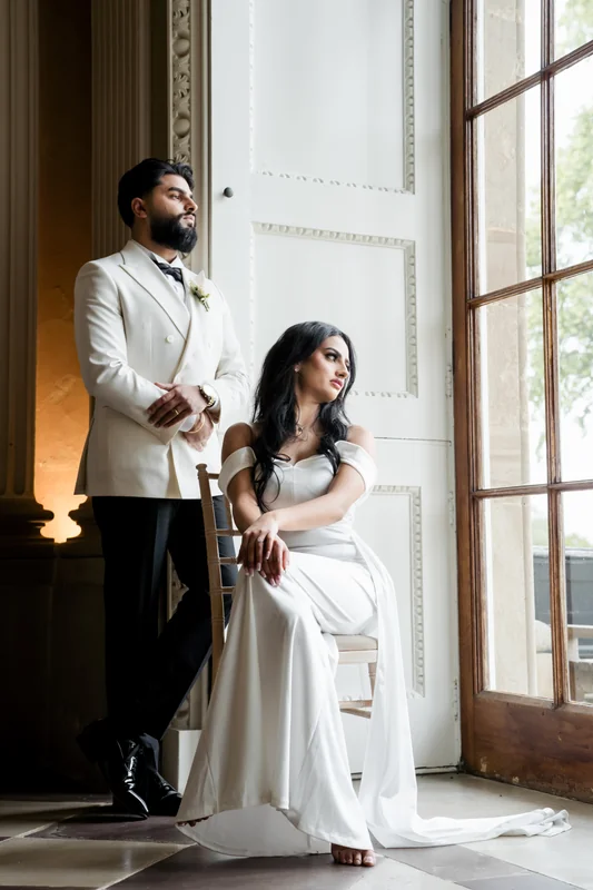 Ajay and Jessica sharing a moment at the window
